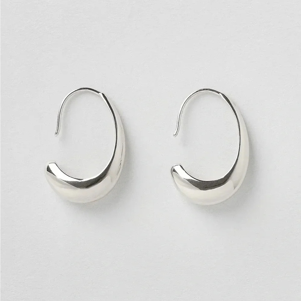 silver crescent hoop tapered earrings